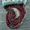 pochette-smartphone-fleur-turquoise-laniere